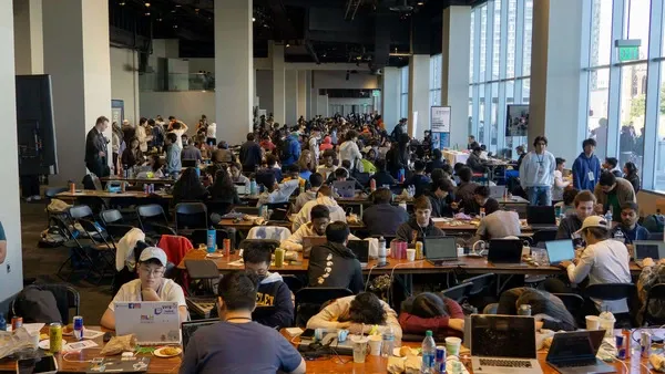 Large group of people at a hackathon